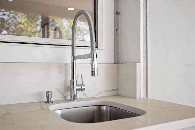 8616 Port Said St, Orlando, FL 32817 - interior details featuring a sink and light stone countertops