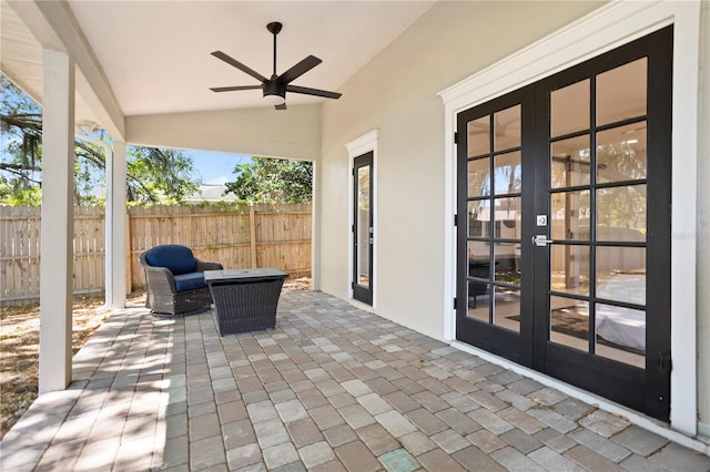 8616 Port Said St, Orlando, FL 32817 - view of patio with a ceiling fan, french doors, and fence