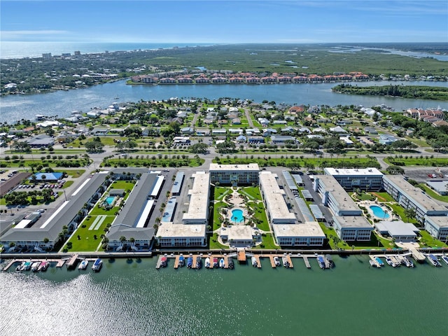 325 N Causeway Unit D104, New Smyrna Beach, FL 32169 - drone / aerial view featuring a water view