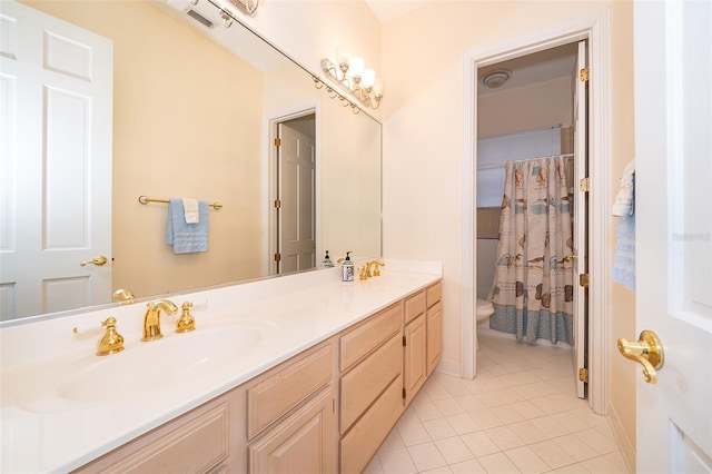 1709 Iverness Ct, Longwood, FL 32779 - bathroom featuring toilet, a sink, tile patterned flooring, visible vents, and double vanity
