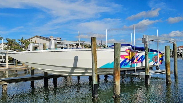 1581 Gulf Blvd Unit 102N, Clearwater Beach, FL 33767 - dock area featuring boat lift and a water view