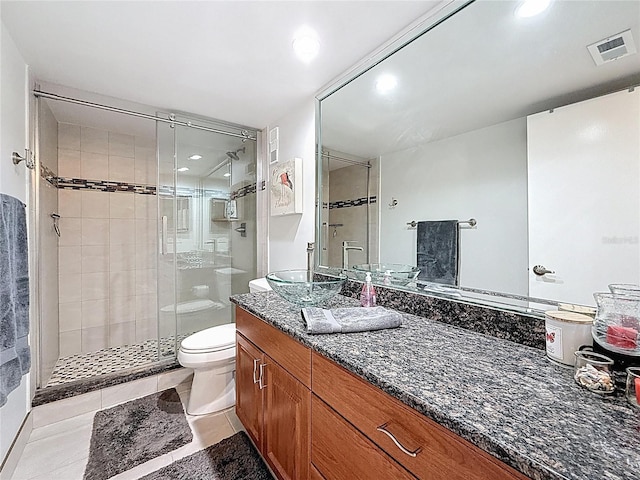 1581 Gulf Blvd Unit 102N, Clearwater Beach, FL 33767 - full bathroom with a shower stall, toilet, vanity, tile patterned flooring, and recessed lighting