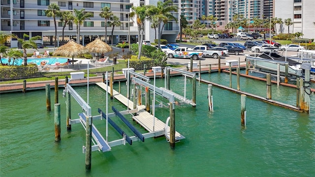 1581 Gulf Blvd Unit 102N, Clearwater Beach, FL 33767 - dock area featuring boat lift and a water view