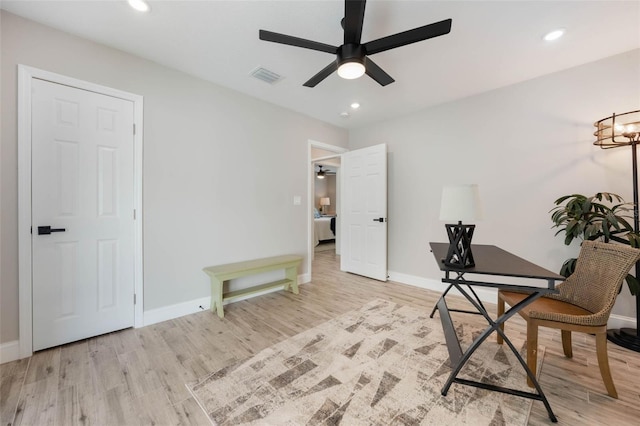unfurnished office featuring recessed lighting, baseboards, light wood finished floors, visible vents, and a ceiling fan