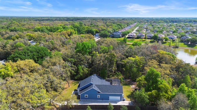 bird's eye view with a forest view