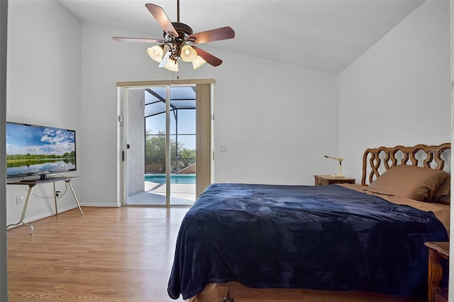 7606 Fordham Creek Ln, Orlando, FL 32818 - bedroom featuring access to outside, wood finished floors, a ceiling fan, and high vaulted ceiling