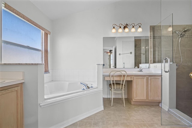 7606 Fordham Creek Ln, Orlando, FL 32818 - full bath with vanity, a stall shower, a garden tub, and tile patterned floors