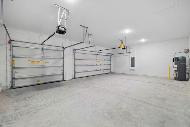 2152 Rock Maple Bnd, Kissimmee, FL 34746 - garage with electric panel, electric water heater, concrete block wall, and a garage door opener