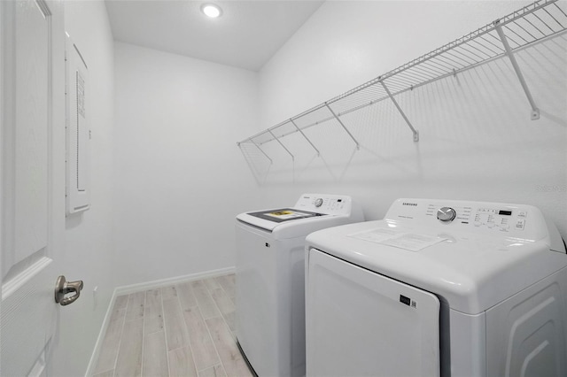 2152 Rock Maple Bnd, Kissimmee, FL 34746 - laundry area with separate washer and dryer, light wood-type flooring, and recessed lighting