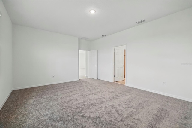 2152 Rock Maple Bnd, Kissimmee, FL 34746 - unfurnished bedroom with carpet floors and baseboards