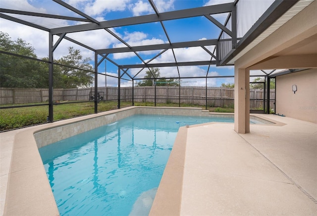 view of swimming pool featuring a patio area, a fenced backyard, glass enclosure, and a fenced in pool