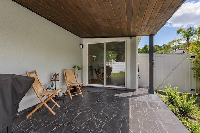 view of patio with fence