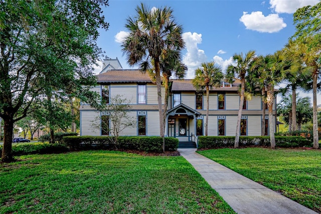 view of front of house with a front lawn