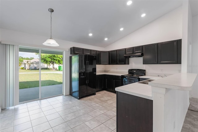 205 Lori Ct, Umatilla, FL 32784 - kitchen with a sink, light countertops, a peninsula, under cabinet range hood, and black appliances