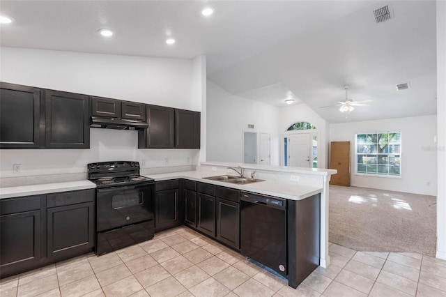 205 Lori Ct, Umatilla, FL 32784 - kitchen featuring a peninsula, black appliances, under cabinet range hood, lofted ceiling, and a sink