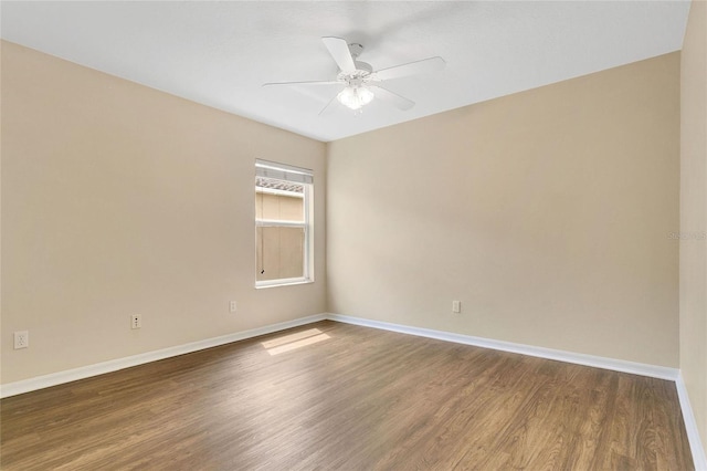 1556 Sherbourne St, Winter Garden, FL 34787 - empty room with baseboards, ceiling fan, and wood finished floors