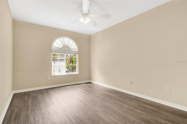 1556 Sherbourne St, Winter Garden, FL 34787 - empty room with a ceiling fan, dark wood-type flooring, and baseboards