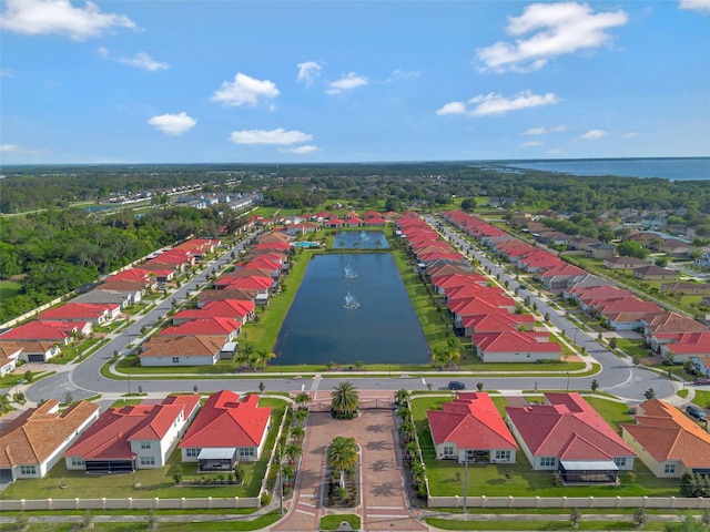 aerial view featuring a residential view and a water view