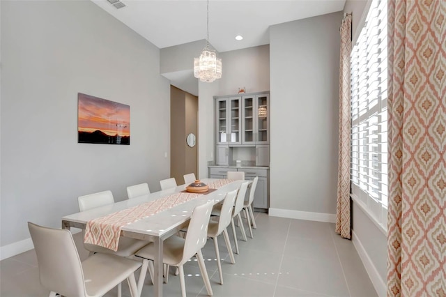 dining space featuring visible vents, baseboards, recessed lighting, an inviting chandelier, and light tile patterned floors