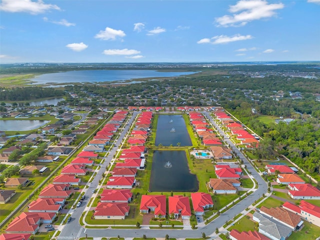 aerial view featuring a residential view and a water view