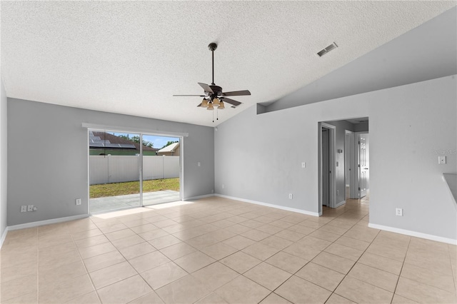 408 Magpie Ct, Kissimmee, FL 34759 - empty room featuring a textured ceiling, ceiling fan, light tile patterned flooring, and lofted ceiling