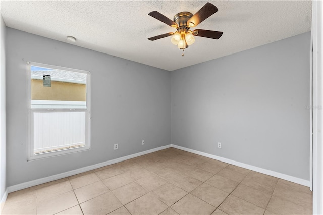 408 Magpie Ct, Kissimmee, FL 34759 - empty room with ceiling fan, a textured ceiling, and light tile patterned flooring