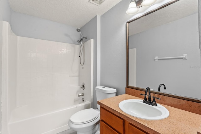 408 Magpie Ct, Kissimmee, FL 34759 - bathroom featuring vanity, bathtub / shower combination, and a textured ceiling