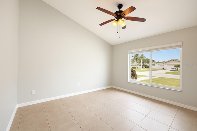 408 Magpie Ct, Kissimmee, FL 34759 - unfurnished room featuring vaulted ceiling, a ceiling fan, and light tile patterned floors