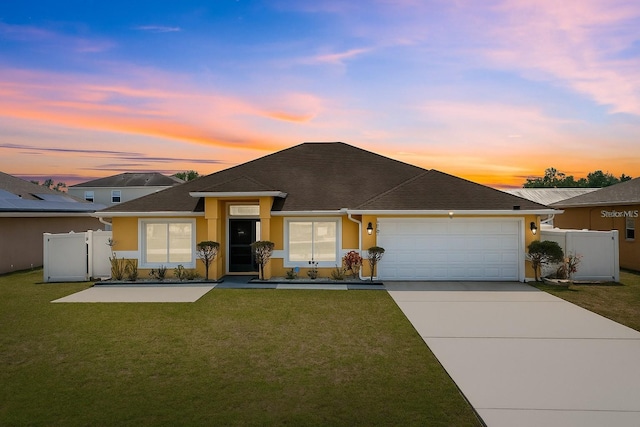 408 Magpie Ct, Kissimmee, FL 34759 - ranch-style home with stucco siding, a garage, concrete driveway, and roof with shingles