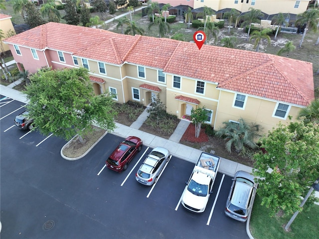 birds eye view of property with a residential view