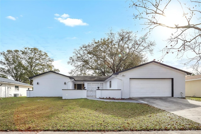 621 Ashberry Ln, Altamonte Springs, FL 32714 - single story home with a front lawn, stucco siding, a garage, and concrete driveway