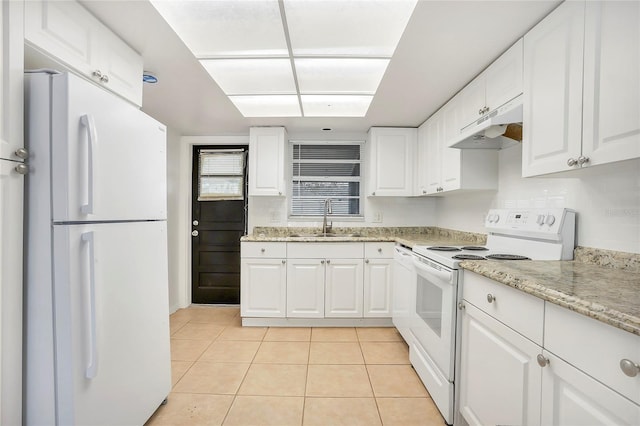 621 Ashberry Ln, Altamonte Springs, FL 32714 - kitchen with white cabinetry, white appliances, light tile patterned floors, under cabinet range hood, and a sink