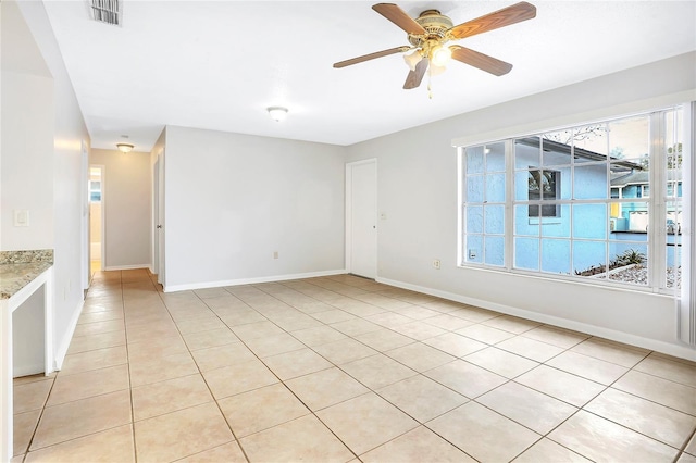621 Ashberry Ln, Altamonte Springs, FL 32714 - spare room featuring baseboards, ceiling fan, visible vents, and light tile patterned flooring