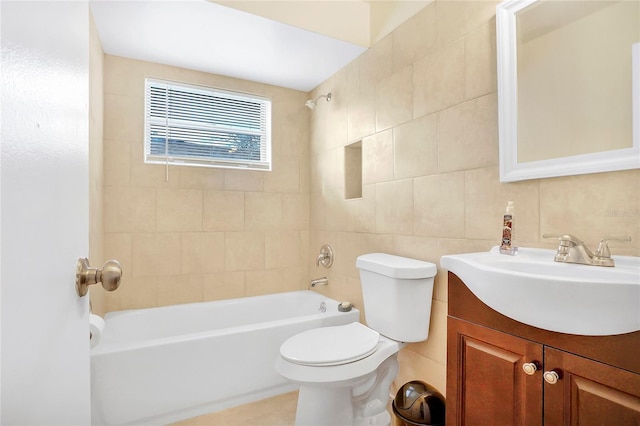 621 Ashberry Ln, Altamonte Springs, FL 32714 - bathroom with tub / shower combination, toilet, vanity, and tile walls