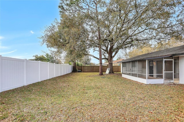 621 Ashberry Ln, Altamonte Springs, FL 32714 - view of yard with a fenced backyard and a sunroom