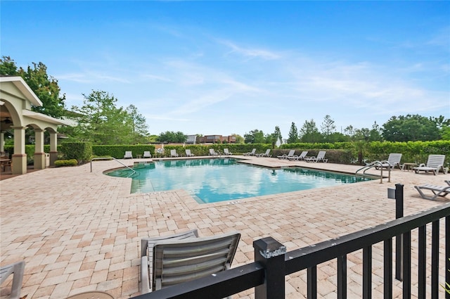 pool with a patio