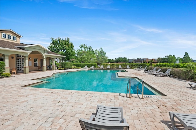 pool featuring a patio