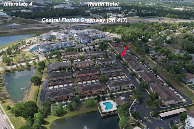 drone / aerial view with a water view