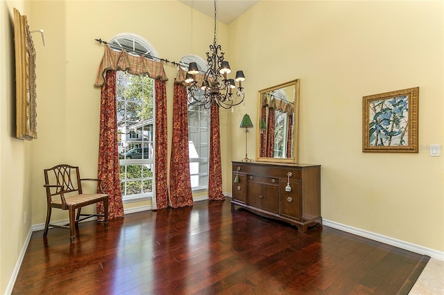interior space featuring a chandelier, wood finished floors, and a wealth of natural light