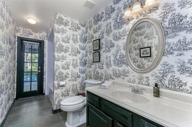 full bath with toilet, wallpapered walls, tile patterned flooring, and visible vents