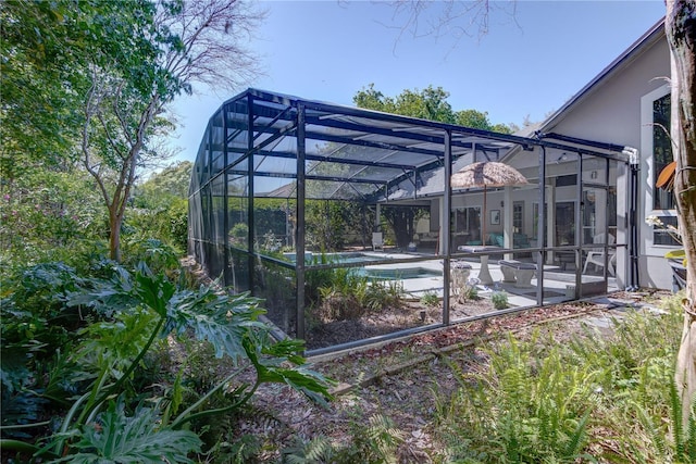exterior space featuring an outdoor pool