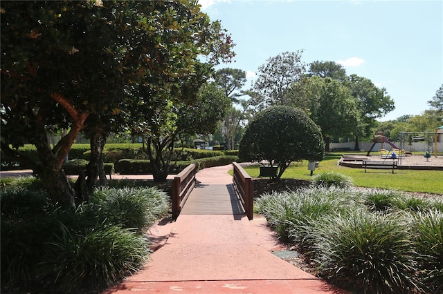 view of home's community with playground community