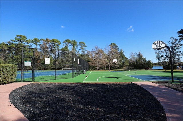 view of sport court featuring community basketball court and fence