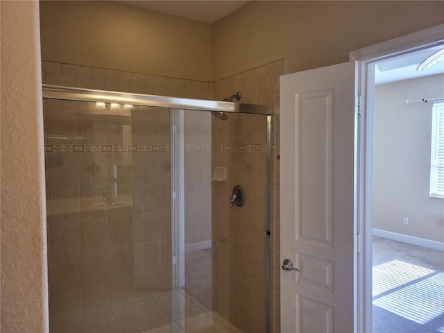 bathroom with a stall shower