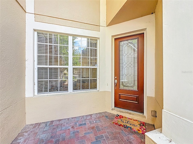 6240 Miramonte Dr Unit 102, Orlando, FL 32835 - doorway to property featuring stucco siding