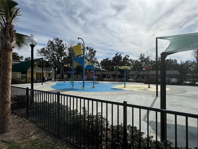 community jungle gym with fence