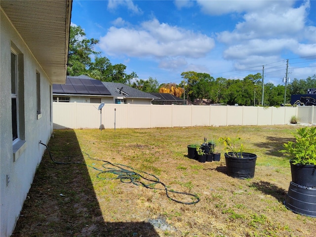 view of yard with fence