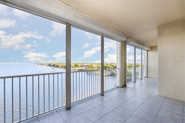 490 Sail Ln Unit 702, Merritt Island, FL 32953 - unfurnished sunroom with a water view