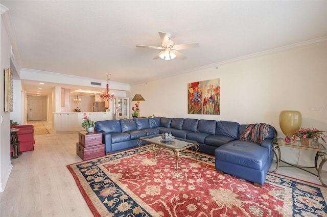490 Sail Ln Unit 702, Merritt Island, FL 32953 - living room with light wood-type flooring, visible vents, ornamental molding, and a ceiling fan
