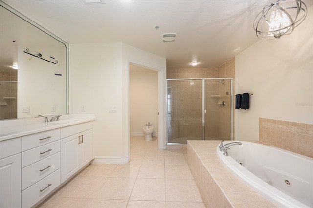 490 Sail Ln Unit 702, Merritt Island, FL 32953 - full bath featuring tile patterned flooring, vanity, a whirlpool tub, a shower stall, and a bidet